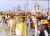 devotees_with_offerings_HT_Kamal_Kishore.jpg (29169 bytes)
